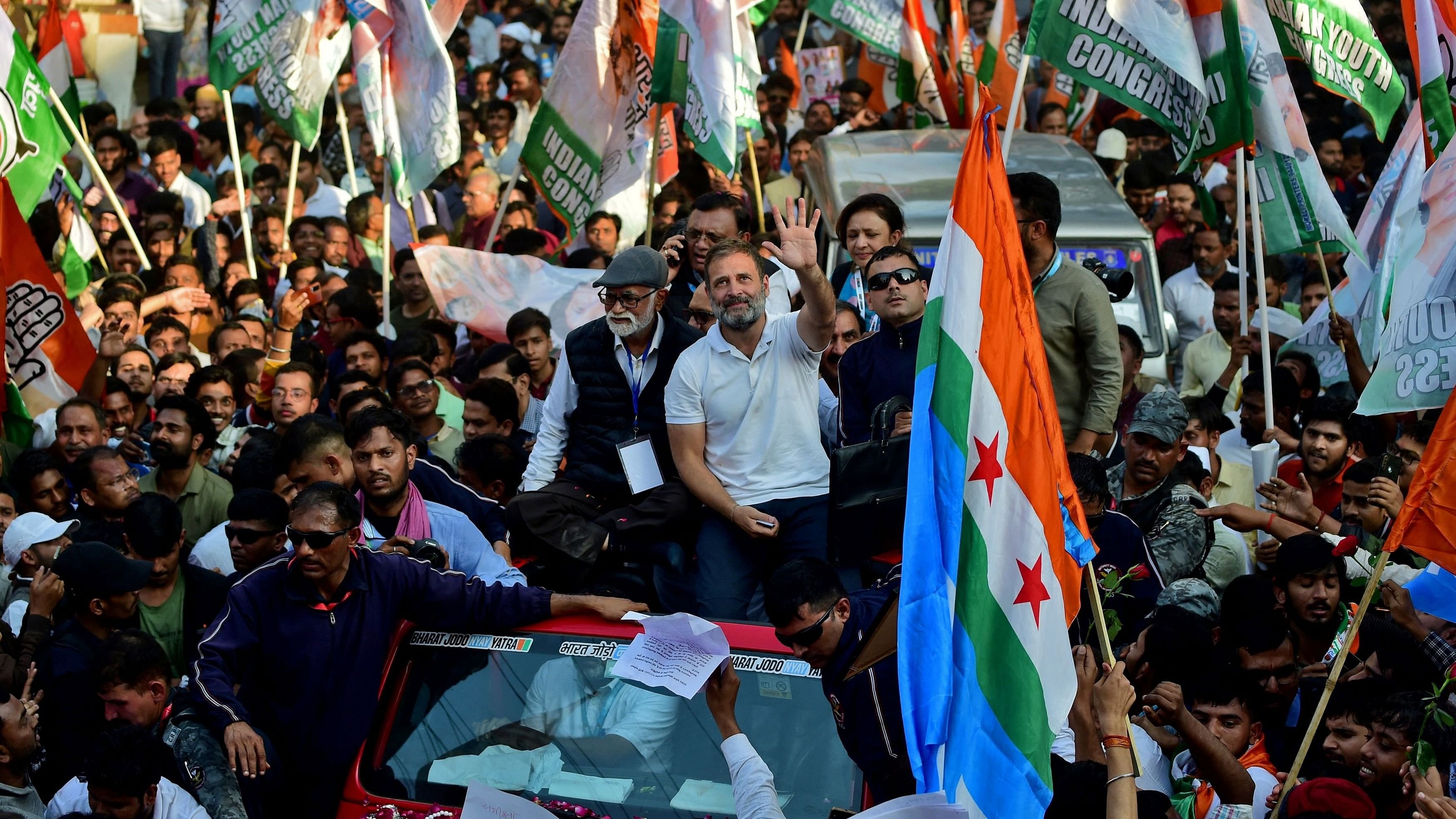 <div class="paragraphs"><p>Rahul Gandhi waves to his supporters at a roadshow during the 'Bharat Jodo Nyay Yatra'.</p></div>