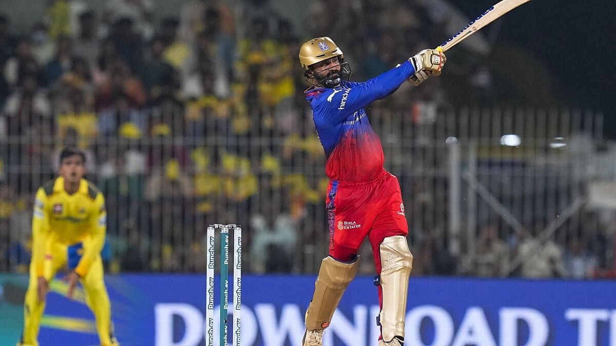 <div class="paragraphs"><p>Royal Challengers Bengaluru's batter Dinesh Karthik plays a shot during the Indian Premier League (IPL) 2024 cricket match between Chennai Super Kings and Royal Challengers Bengaluru at MA Chidambaram Stadium, in Chennai, Friday, March 22, 2024.</p></div>