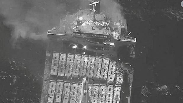 <div class="paragraphs"><p>An aerial view of the Barbados-flagged ship True Confidence ablaze following a Houthi missile attack at sea, March 6, 2024, in this handout photo. </p></div>