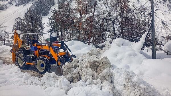 <div class="paragraphs"><p>A snow clearing machine being used to remove snow from a road at Sissu, in Lahaul and Spiti district.</p></div>