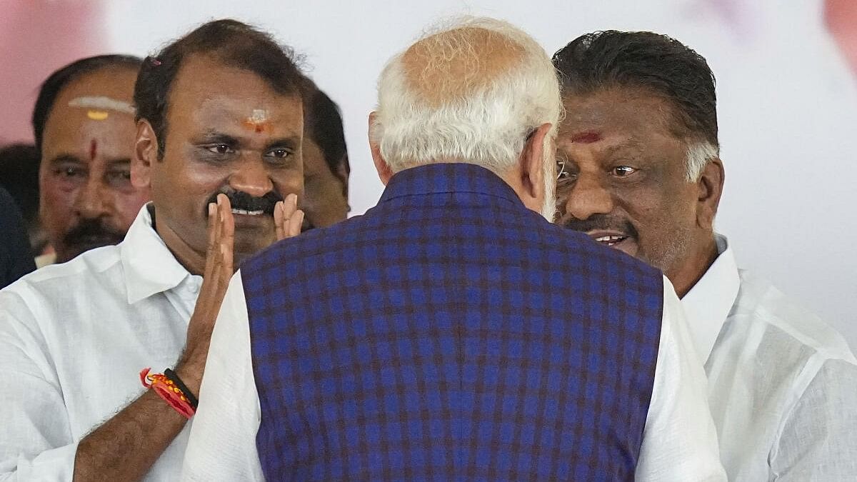 <div class="paragraphs"><p>PM Narendra Modi with former Tamil Nadu CM O Panneerselvam and Union MoS L Murugan during a public meeting ahead of Lok Sabha elections, in Salem, Tamil Nadu.&nbsp;</p></div>