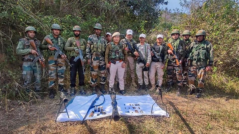 <div class="paragraphs"><p>An earlier picture of Assam Rifles and Manipur Police personnel with seized arms and ammunition at Sabungkhok Khunao Chanung ridge, in Imphal East</p></div>