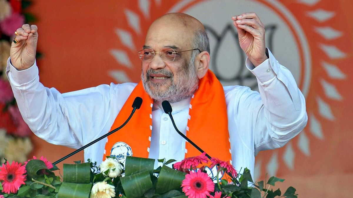 <div class="paragraphs"><p>Union Home Minister Amit Shah addresses during the ‘Pichhra-Atipichhra Sammelan’ ahead of the Lok Sabha elections, in Patna, Saturday, March 9, 2024</p></div>