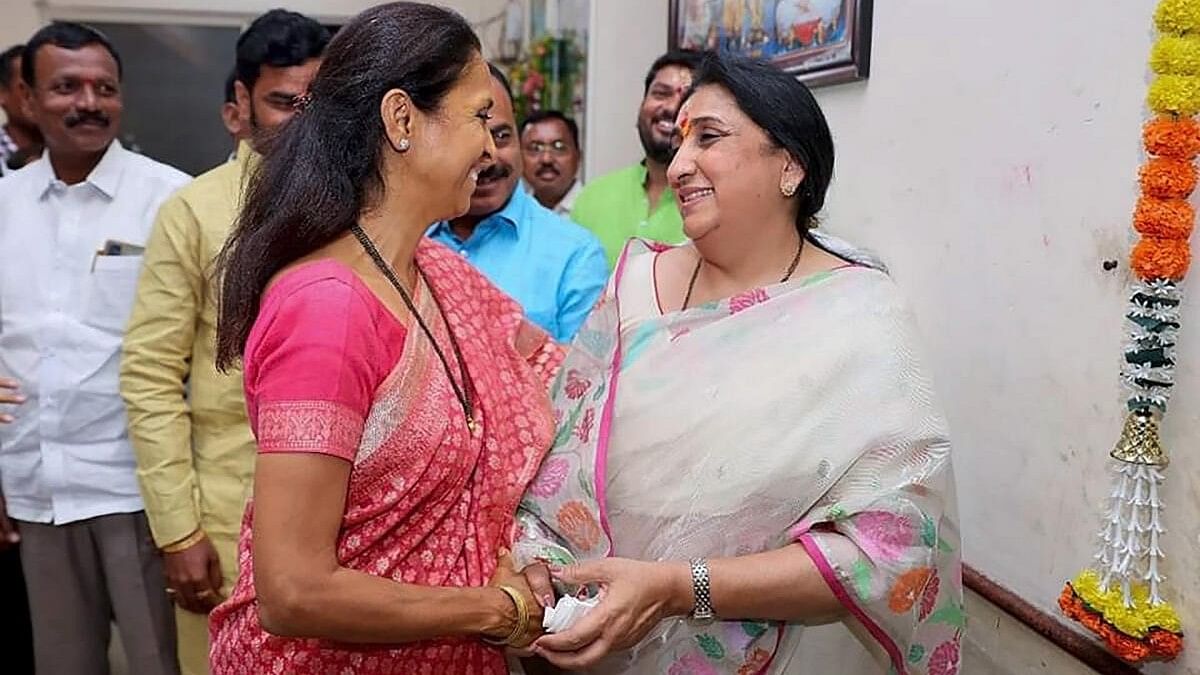 <div class="paragraphs"><p>NCP(SP) leader Supriya Sule and Ajit Pawar's wife Sunetra Pawar meet at a temple in Baramati tehsil, in Pune.&nbsp;</p></div>