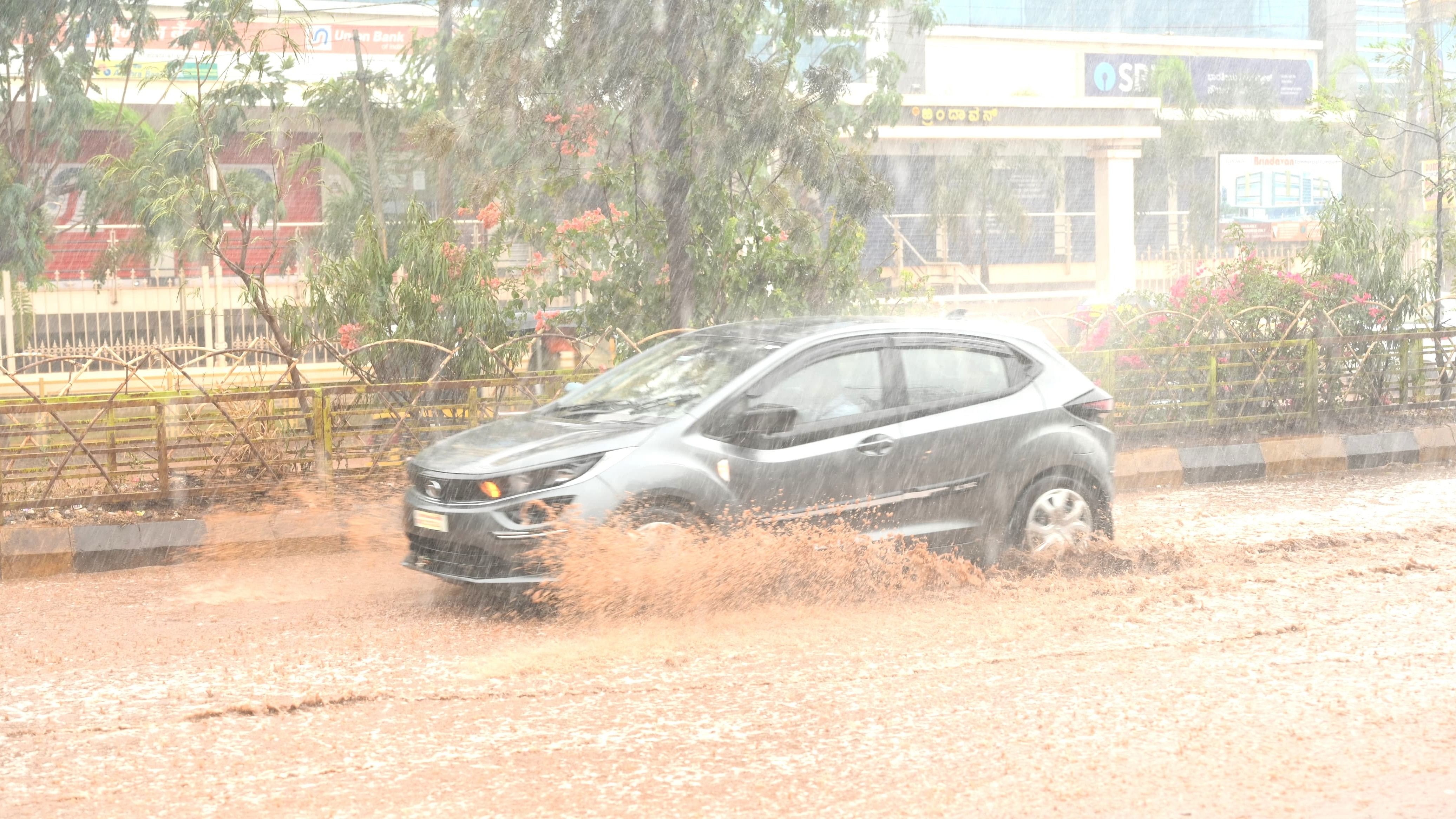 <div class="paragraphs"><p>A car wades through the flooded Shivanagar Main Road in Bidar following heavy rains on Sunday evening. </p></div>
