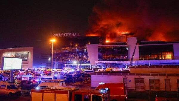 <div class="paragraphs"><p>Smoke from fire rises above the burning Crocus City Hall concert venue following a shooting incident, outside Moscow, Russia.</p></div>