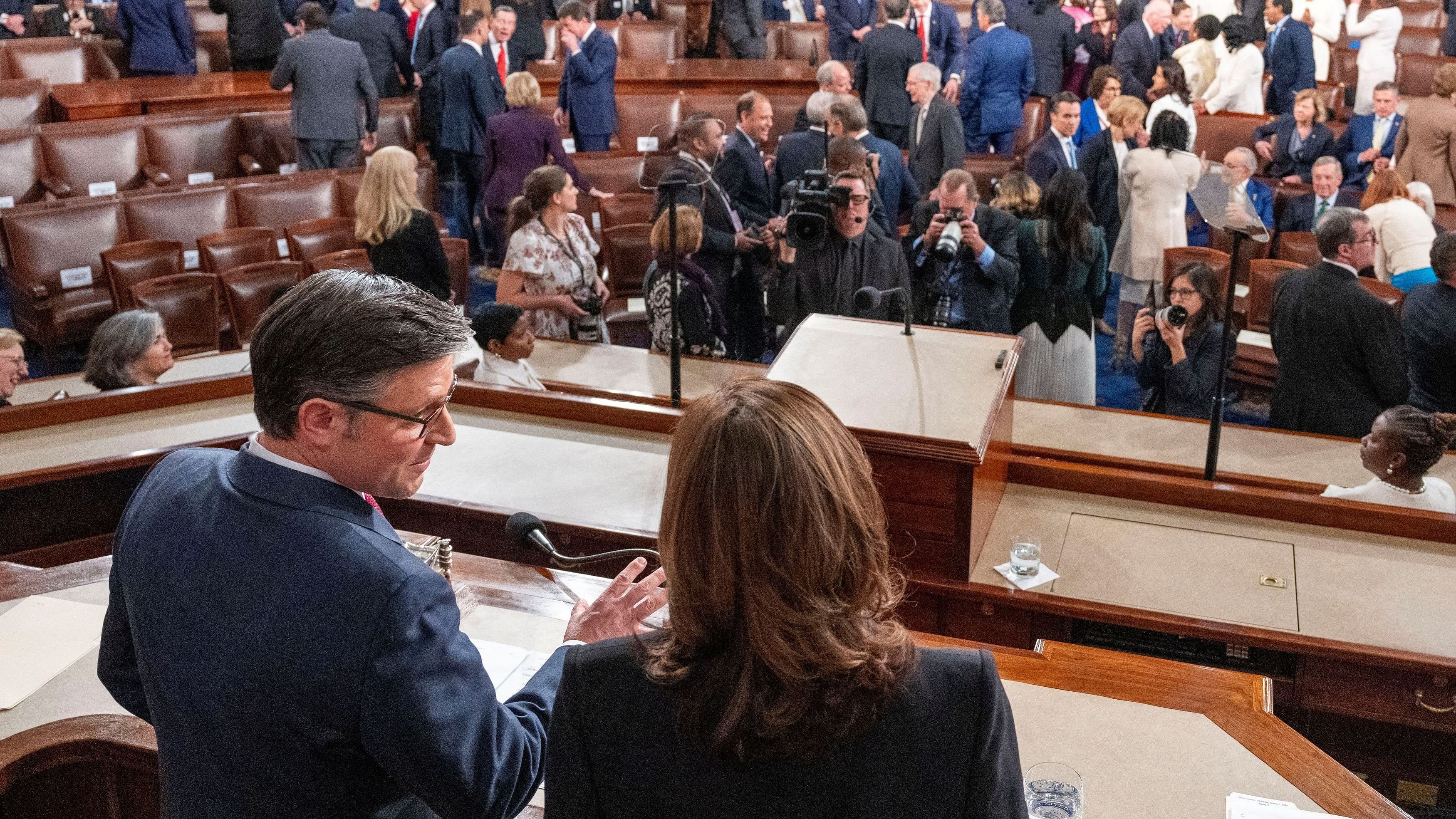 <div class="paragraphs"><p>Speaker of the House Mike Johnson and Vice President Kamala Harris talk in the House of Representatives ahead of US President Joe Biden's third State of the Union address to a joint session of Congress in the US Capitol in Washington.</p></div>