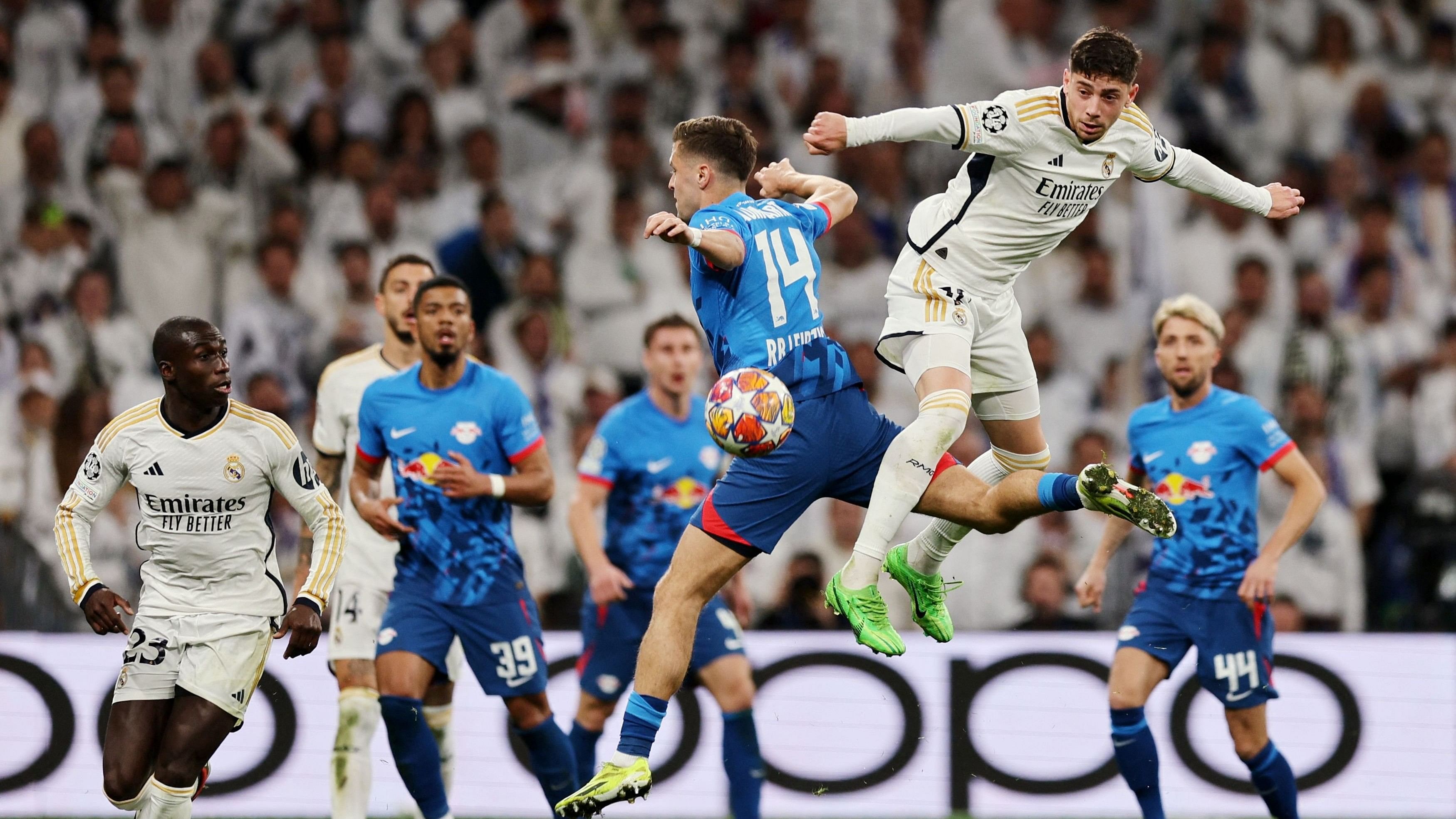 <div class="paragraphs"><p>Real Madrid's Federico Valverde in action with RB Leipzig's Christoph Baumgartner.</p></div>