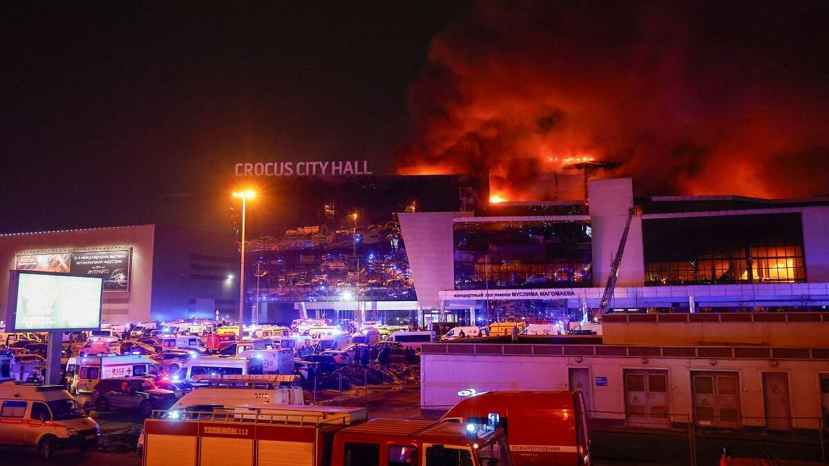 <div class="paragraphs"><p>Smoke from fire rises above the burning Crocus City Hall concert venue following a shooting incident, outside Moscow, Russia.</p></div>