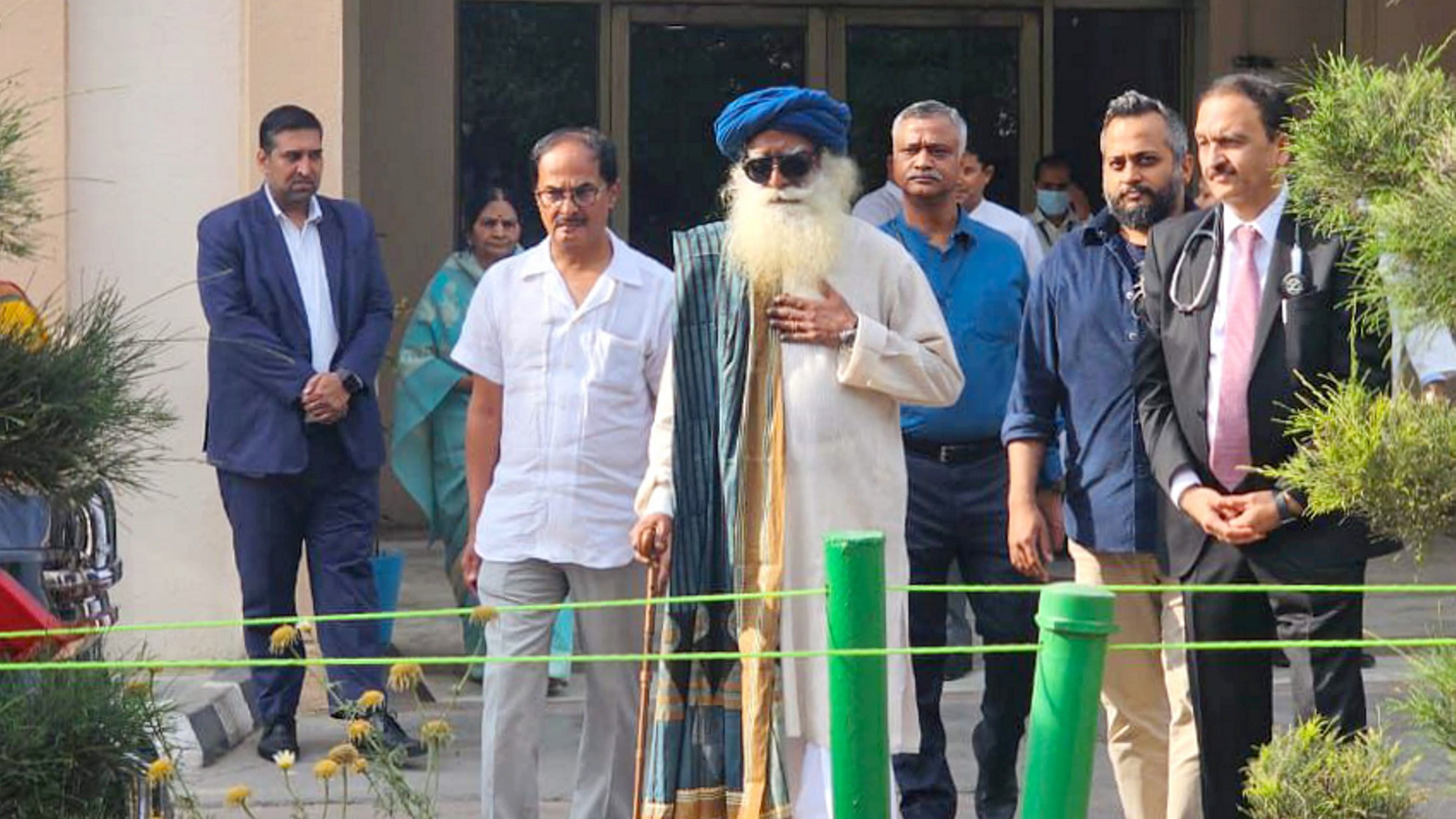 <div class="paragraphs"><p>New Delhi: Spiritual leader Sadhguru Jaggi Vasudev leaves after being discharged from the Indraprastha Apollo Hospital after a brain surgery, in New Delhi, Wednesday, March 27, 2024. </p></div>