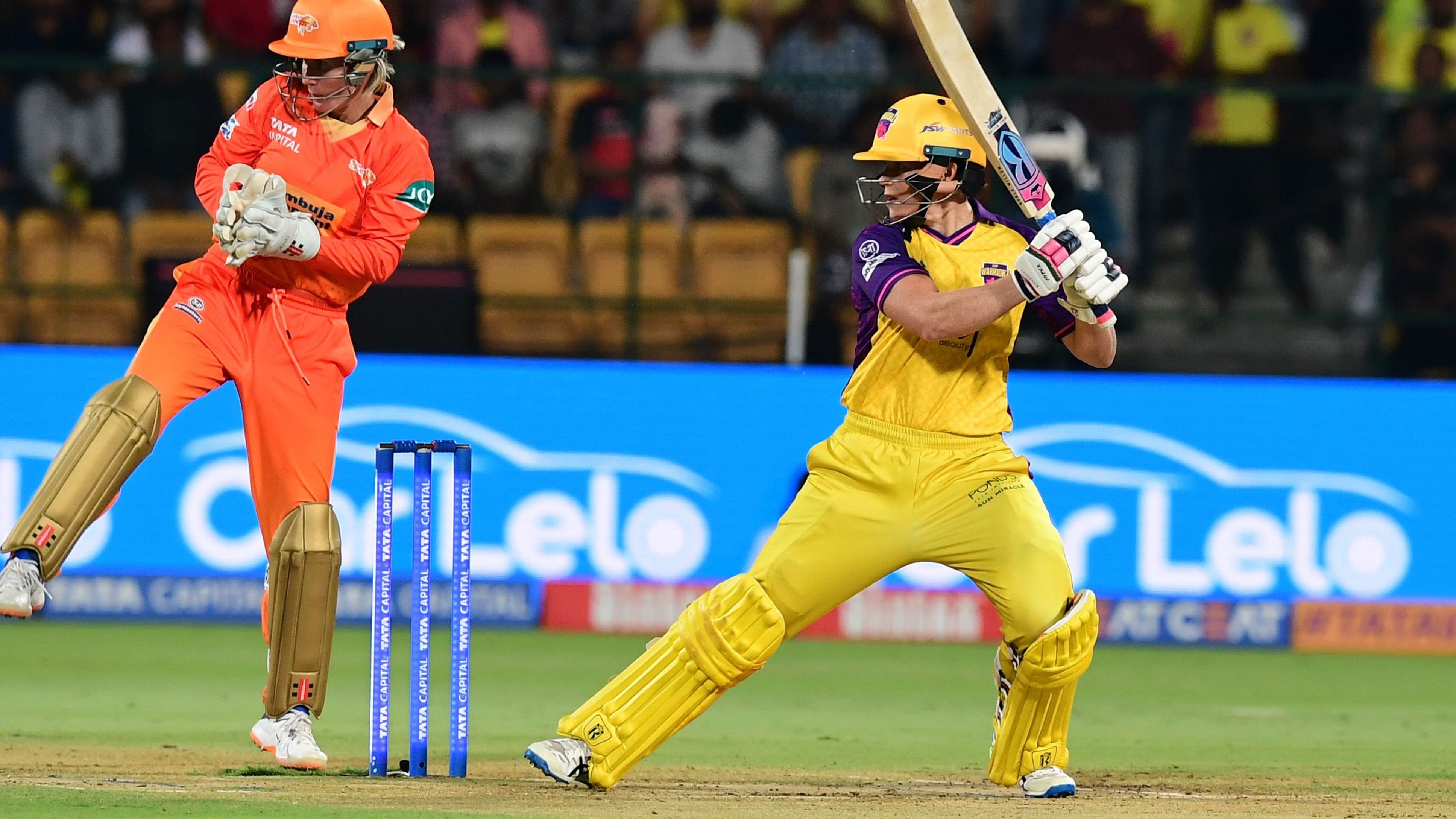 <div class="paragraphs"><p>UP Warriorz' Grace Harris cuts one to the boundary against Gujarat Giants at M Chinnaswamy Stadium on Friday.  </p></div>