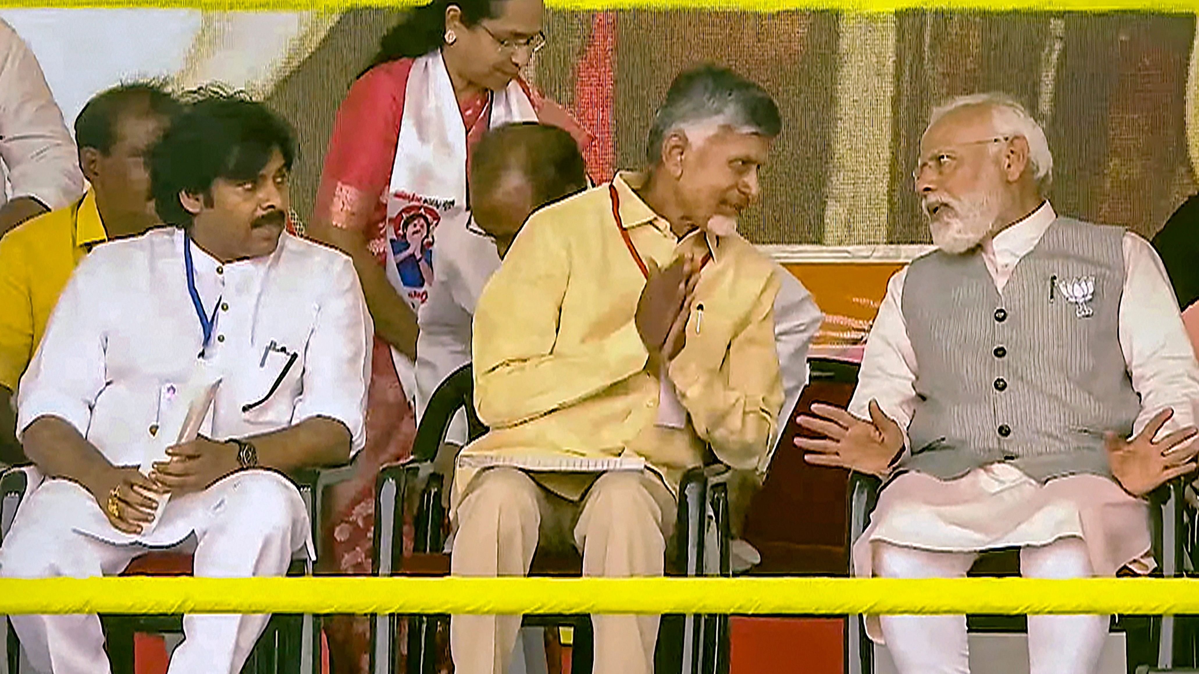 <div class="paragraphs"><p>Prime Minister Narendra Modi with TDP chief N Chandrababu Naidu and Janasena chief Pawan Kalyan during a public meeting in Palnadu, Andhra Pradesh, Sunday, March 17, 2024. </p></div>