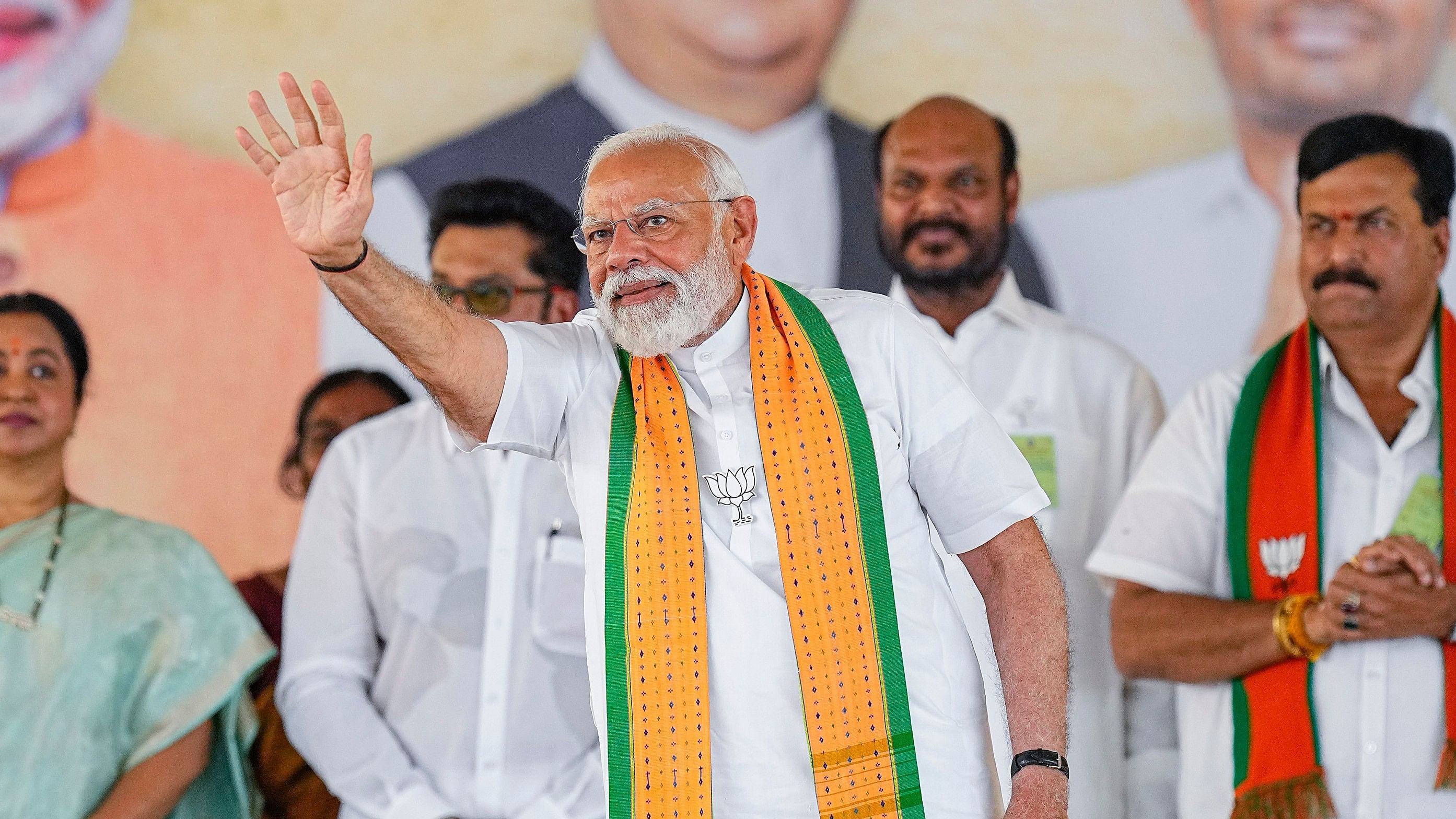 <div class="paragraphs"><p>Kanyakumari: Prime Minister Narendra Modi waves to supporters during a public meeting, ahead of the Lok Sabha election, in Kanyakumari, Friday, March 15, 2024</p></div>