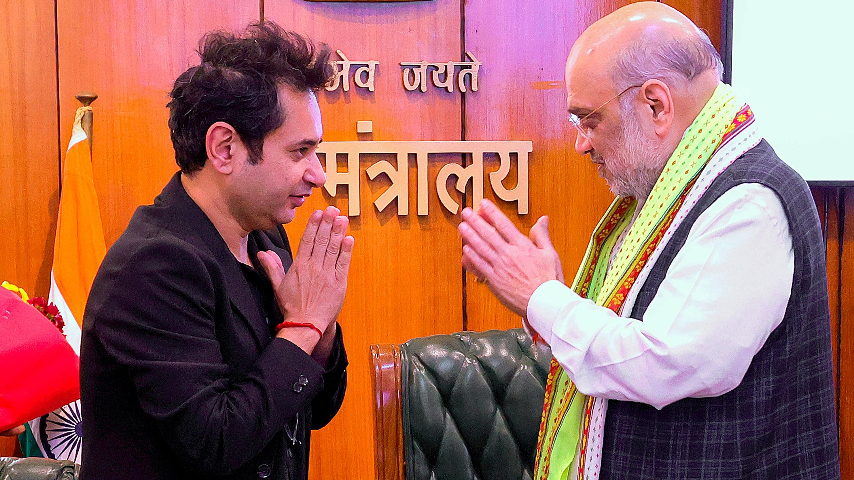 <div class="paragraphs"><p>Union Home Minister Amit Shah being greeted by Pradyot Debbarma during the signing of agreement between TIPRA Motha and the governments of Tripura and India, in New Delhi.</p></div>