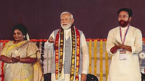 <div class="paragraphs"><p>Prime Minister Narendra Modi with Tenalgana Governor Tamilisai Soundararajan and Union Minister G Kishan Reddy during inauguration and foundation stone laying of multiple developmental projects, in Sangareddy, Tuesday, March 5, 2024.</p></div>