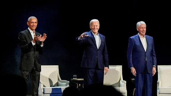<div class="paragraphs"><p>U.S. President Biden and former Presidents Obama and Clinton participate in a discussion at Radio City Music Hall in New York.</p></div>
