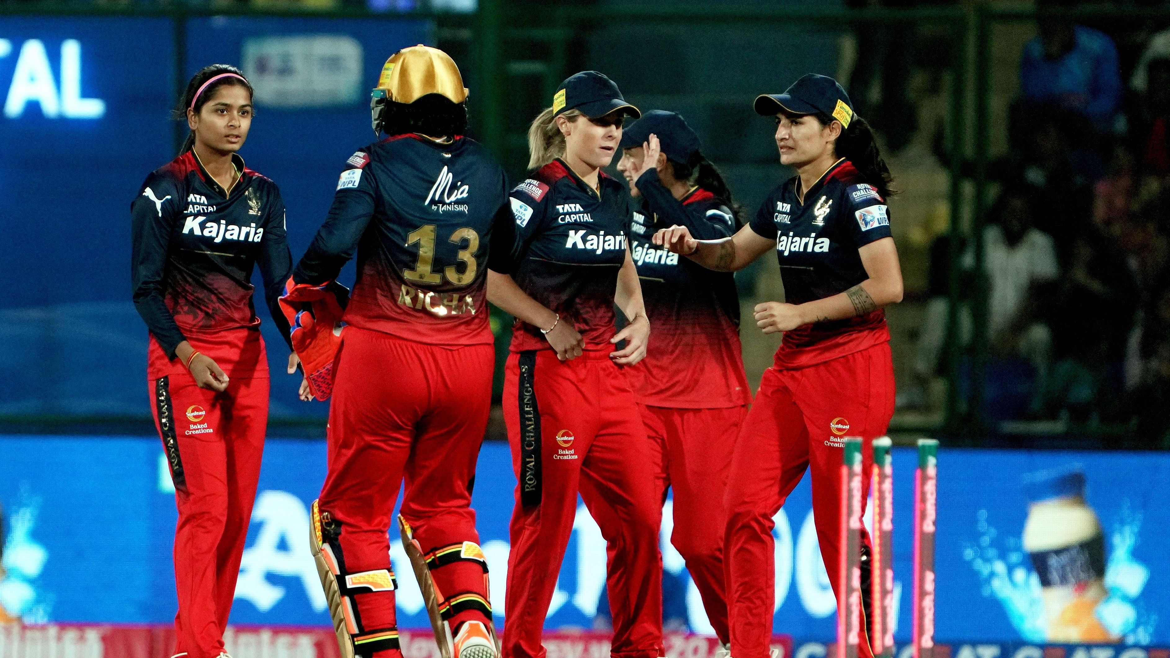 <div class="paragraphs"><p>New Delhi: RCB players celebrate a wicket during the Women's Premier League (WPL) 2024 cricket match between Delhi Capitals and Royal Challengers Bangalore at Arun Jaitley Stadium, in New Delhi, Sunday, March 10, 2024. </p></div>