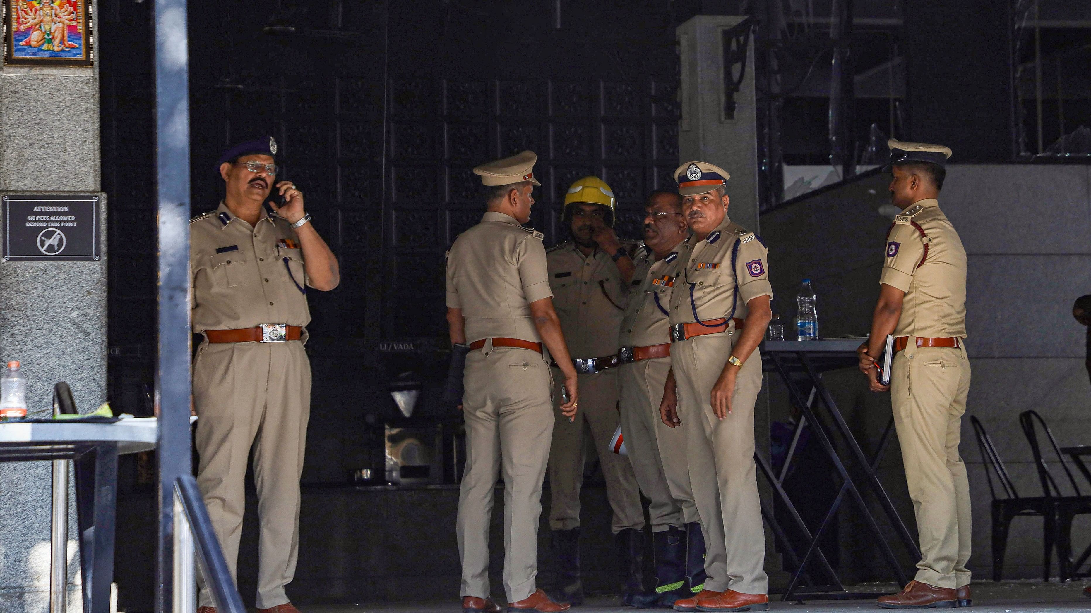 <div class="paragraphs"><p>Police personnel at the Rameshwaram Cafe after a blast, in Bengaluru, Friday, March 1, 2024. At least nine people were injured in the blast, according to police. (PTI Photo) (PTI03_01_2024_000225A)</p></div>