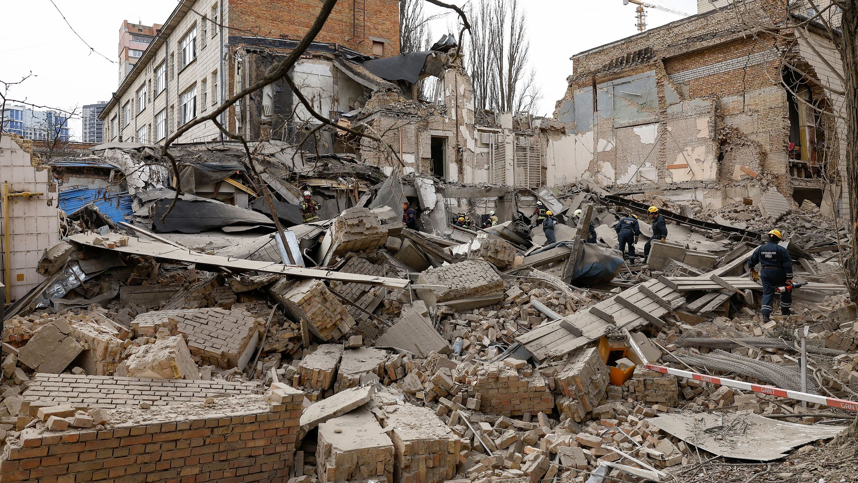 <div class="paragraphs"><p>Rescuers work at the site of a building damaged by a Russian missile strike, amid Russia's attack on Ukraine, in Kyiv, Ukraine, March 25, 2024. </p></div>