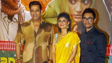 <div class="paragraphs"><p>Actors Ravi Kishan, Aamir Khan and film producer and screenwriter Kiran Rao pose during the screening of film 'Laapataa Ladies', in Mumbai, Tuesday, Feb. 27, 2024.</p></div>