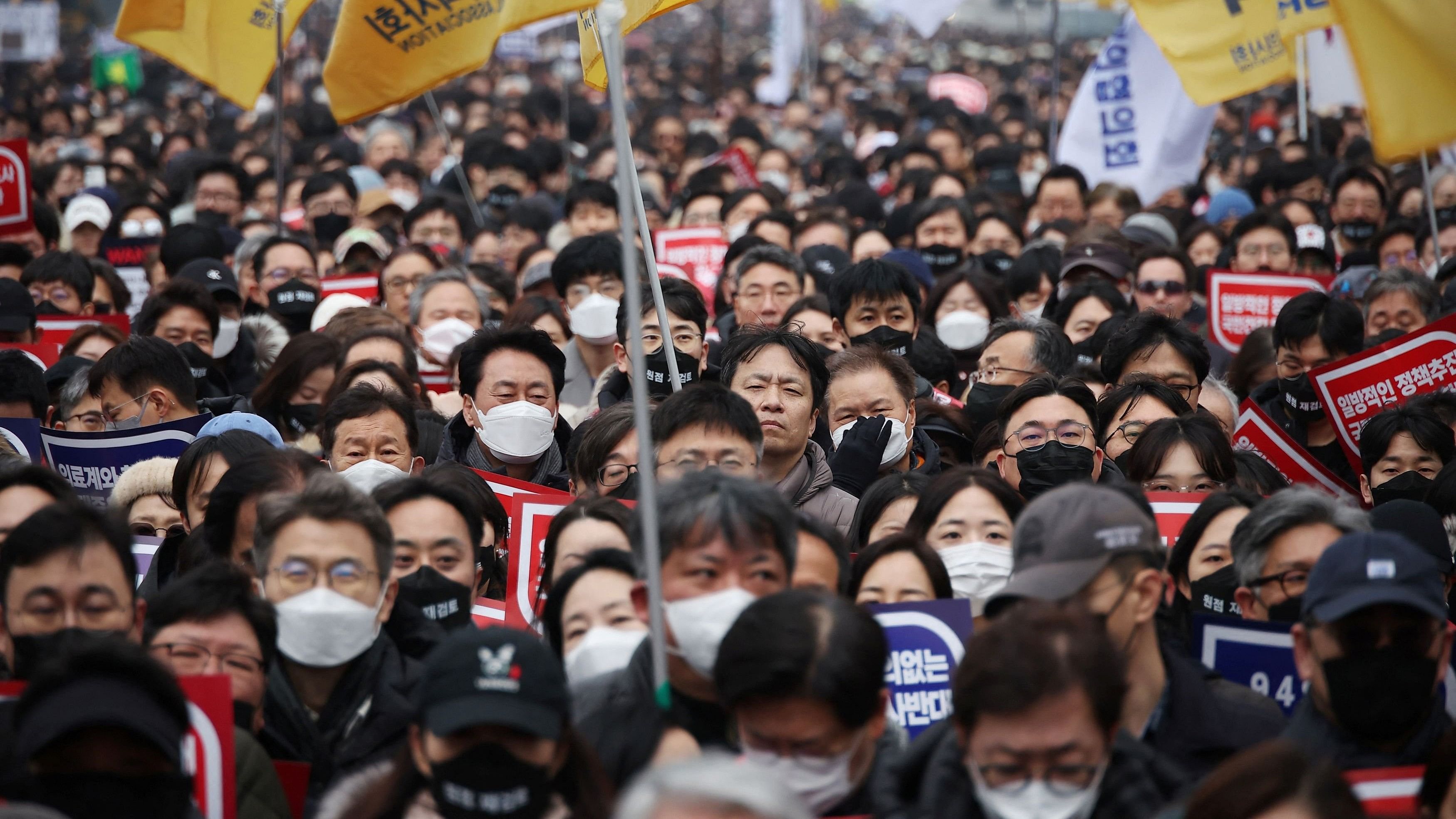 <div class="paragraphs"><p>Doctors take part in a rally to protest against government plans to increase medical school admissions in Seoul, South Korea.</p></div>