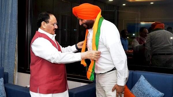 <div class="paragraphs"><p> BJP National President JP Nadda welcomes Punjab's Ludhiana MP Ravneet Singh Bittu who joined the party.</p></div>