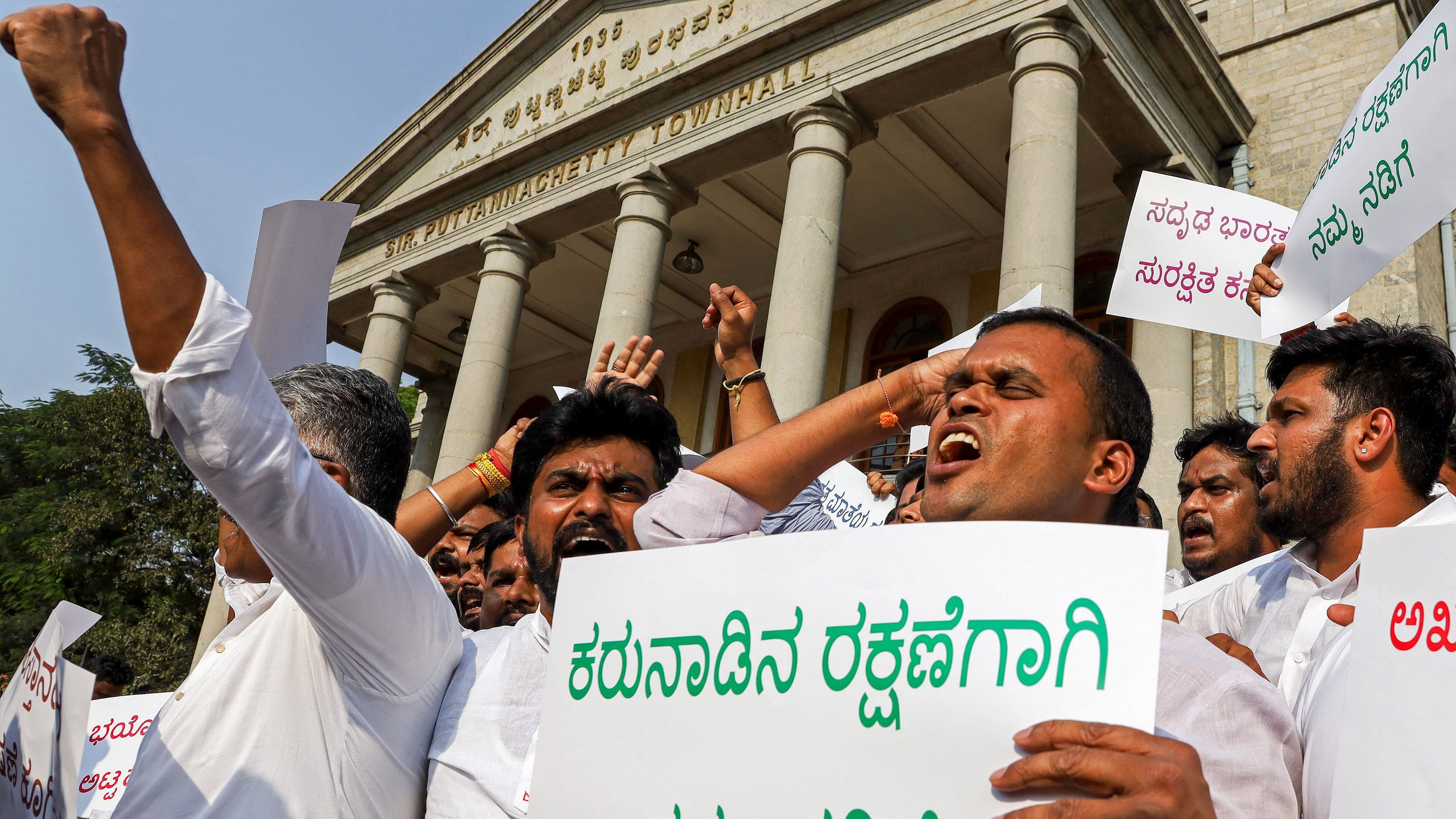 <div class="paragraphs"><p>BJP Yuva Morcha members shout slogans during their protest against the state government over the alleged sloganeering of 'Pakistan Zindabad' following Congress leader Nassir Hussain's win in the recently-held Rajya Sabha elections, at Town Hall in Bengaluru.</p></div>