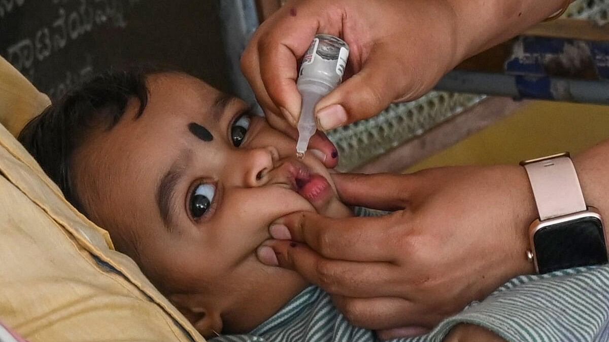 <div class="paragraphs"><p>Nurse, Health worker administered Polio drops to kid in Pulse Polio, National Immunisation day programme by BBMP at Primary Health Centre in Bengaluru on Sunday, 03rd March 2024</p></div>