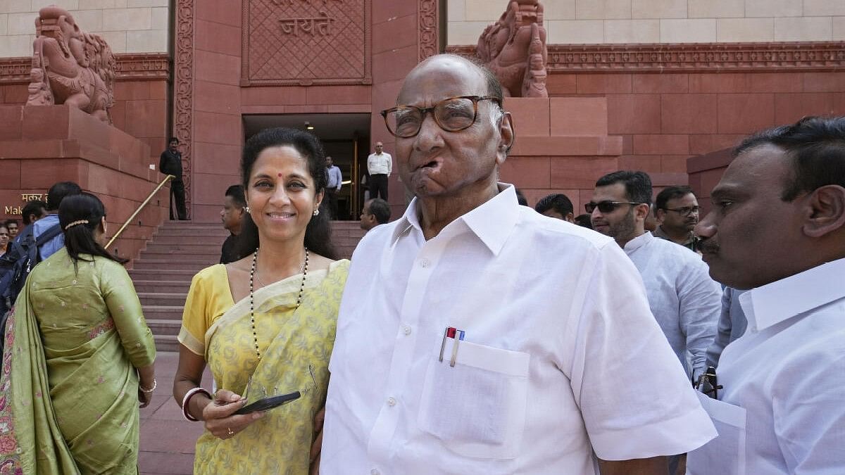 <div class="paragraphs"><p>File photo of Sharad Pawar and Supriya Sule during the special session of Parliament, in New Delhi.</p></div>