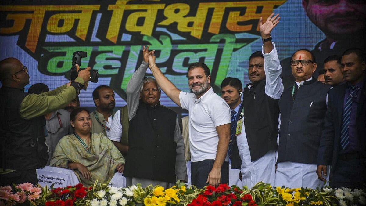 <div class="paragraphs"><p>Congress leader Rahul Gandhi with RJD chief Lalu Prasad Yadav during the Jan Vishwas Rally in Patna.</p></div>