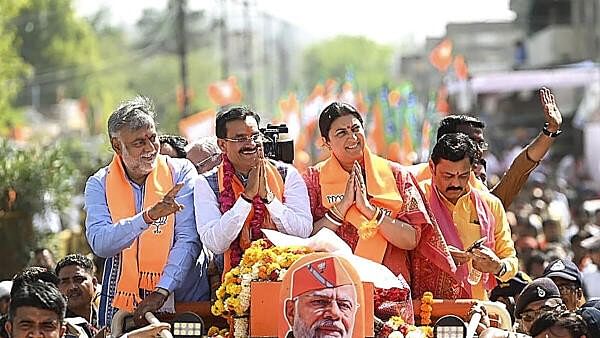 <div class="paragraphs"><p>Union Ministers Smriti Irani and Prahlad Patel with BJP candidate VD Sharma during a rally before the latter files his nomination papers ahead of Lok Sabha elections, in Panna, Madhya Pradesh, Wednesday, April 3, 2024.</p></div>