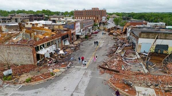 <div class="paragraphs"><p>Damaged buildings are seen in an aerial photograph after the town was hit by a tornado the night before in Sulphur, Oklahoma, US.</p></div>