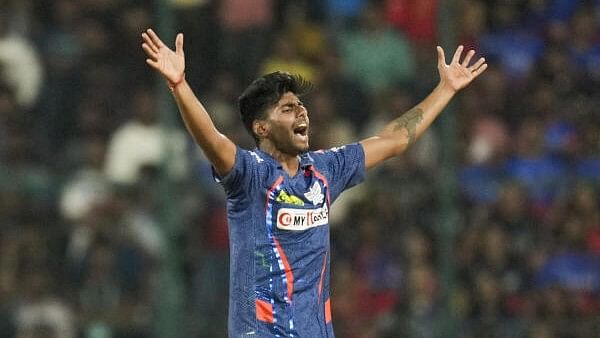 <div class="paragraphs"><p>Lucknow Super Giants's Mayank Yadav appeals unsuccessfully during the Indian Premier League (IPL) 2024 T20 cricket match between Royal Challengers Bengaluru and Lucknow Super Giants, at M Chinnaswamy Stadium, in Bengaluru, Tuesday, April 2, 2024. </p></div>