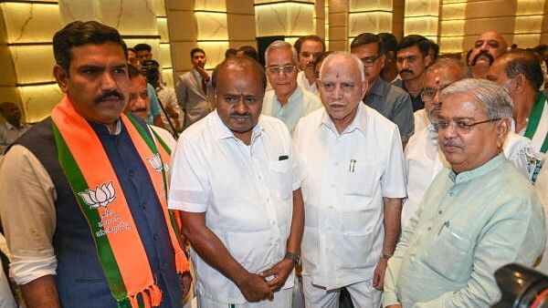 <div class="paragraphs"><p>BJP-JD(S) leaders in Bengaluru</p></div>