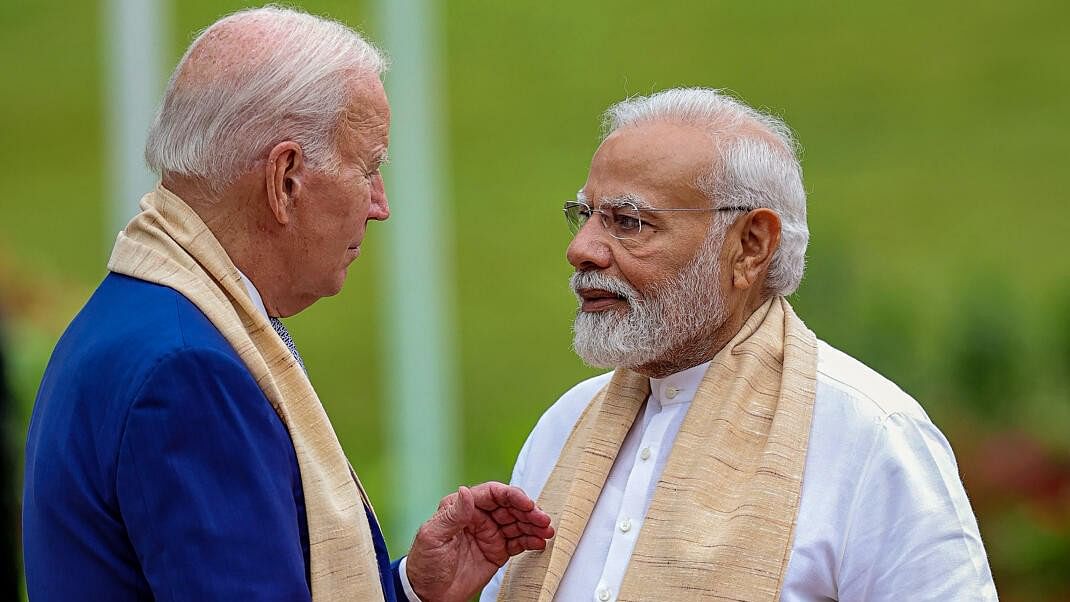 <div class="paragraphs"><p>Prime Minister Narendra Modi with US President Joe Biden</p></div>