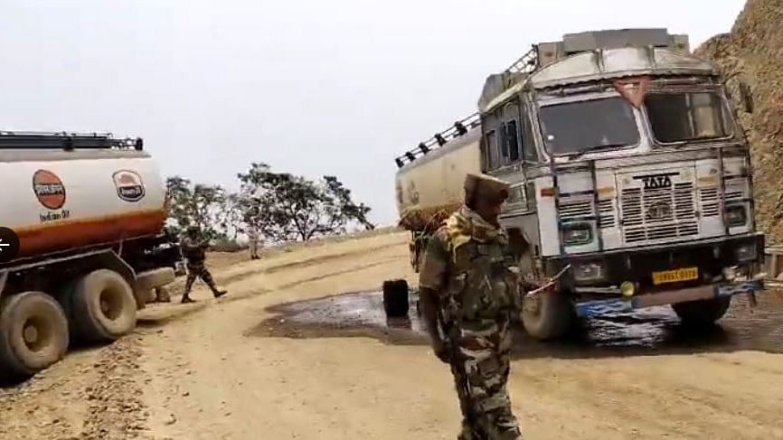 <div class="paragraphs"><p>Screengrab of a video showing an army personnel on&nbsp;NH-37 in Manipur where a few armed men attacked fuel tankers.</p></div>