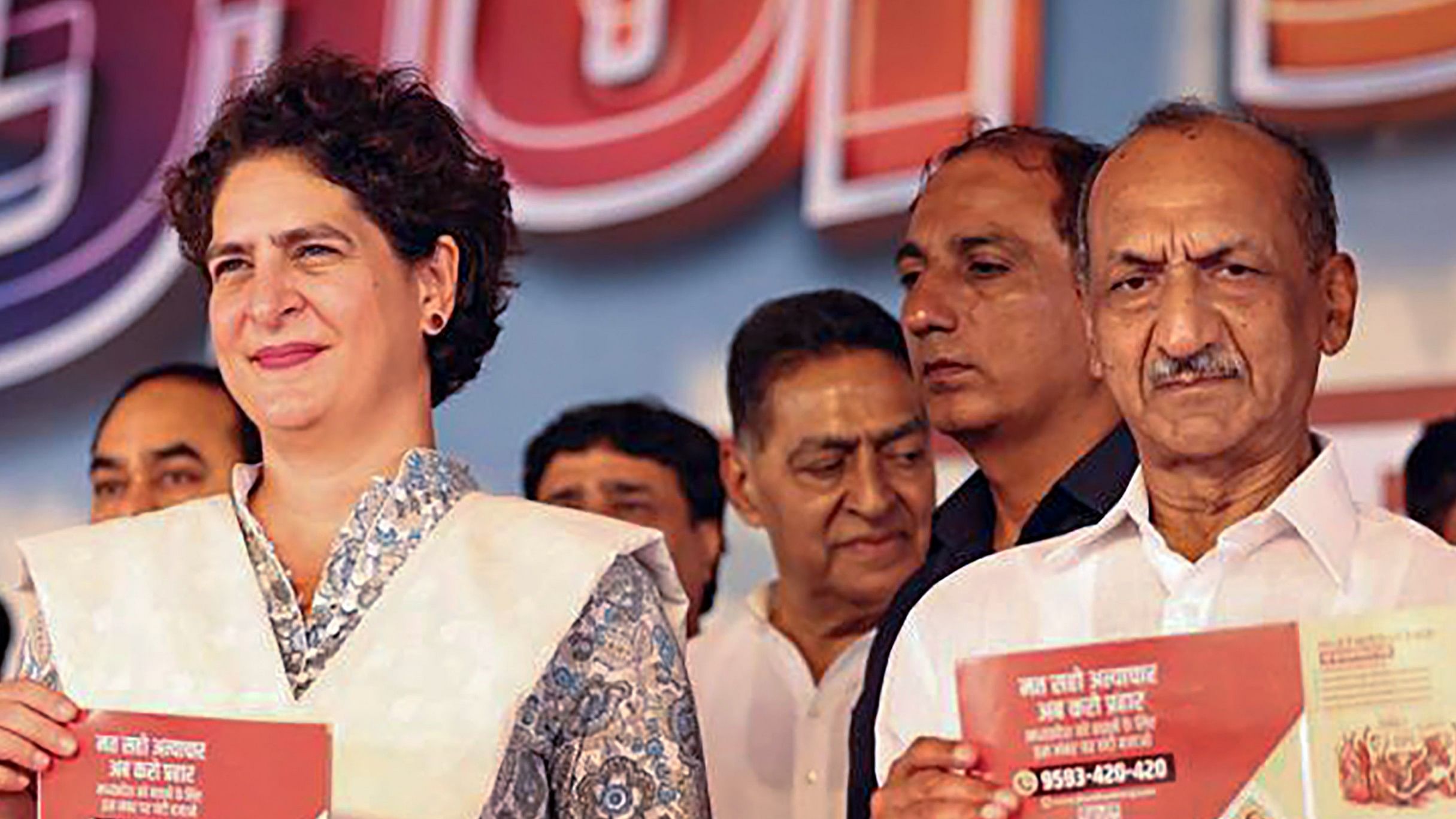 <div class="paragraphs"><p>File photo of AICC General Secretary Priyanka Gandhi Vadra with  J P Agarwal</p></div>