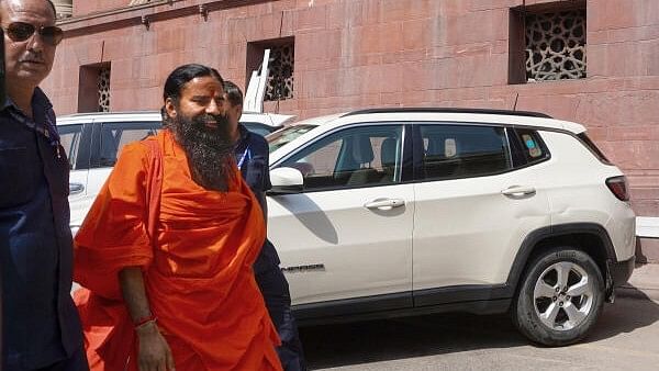 <div class="paragraphs"><p>Yoga guru Ramdev arrives at the Supreme Court for hearing on the Patanjali misleading advertisements case, in New Delhi on April 23, 2024.</p></div>