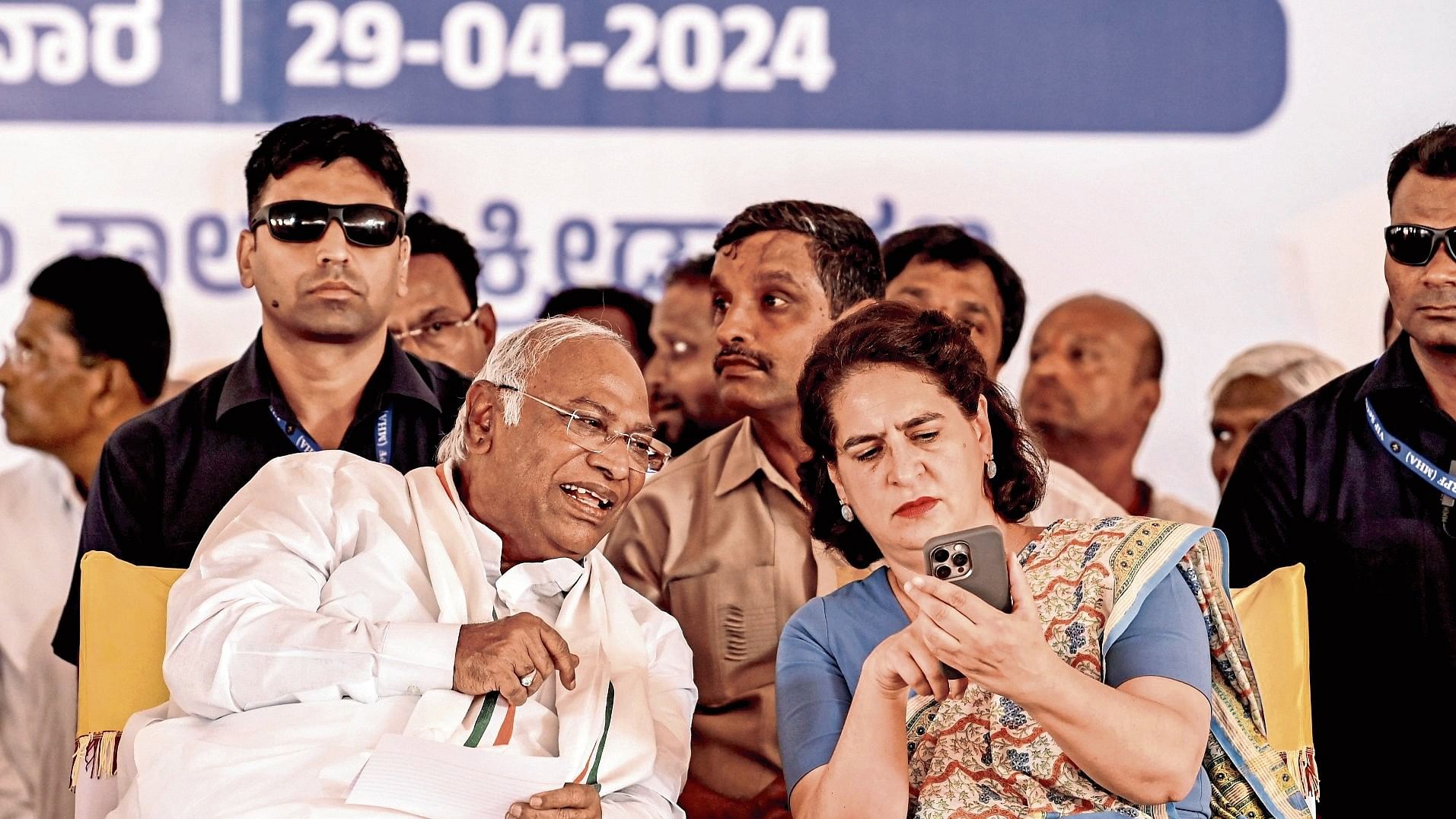 <div class="paragraphs"><p>All India Congress Committee president Mallikarjun Kharge and general secretary Priyanka Gandhi share a word during the election campaign in Sedam in Kalaburagi district on Monday. </p></div>