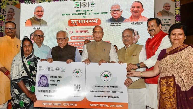 <div class="paragraphs"><p>Union Home Minister Rajnath Singh flanked by UP Governor Ram Naik (L) and UP Assembly Speaker Hriday Narayan Dixit at the launch of Ayushman Bharat-National Health Protection Mission (AB-NHPM), in Lucknow. File Photo.</p></div>