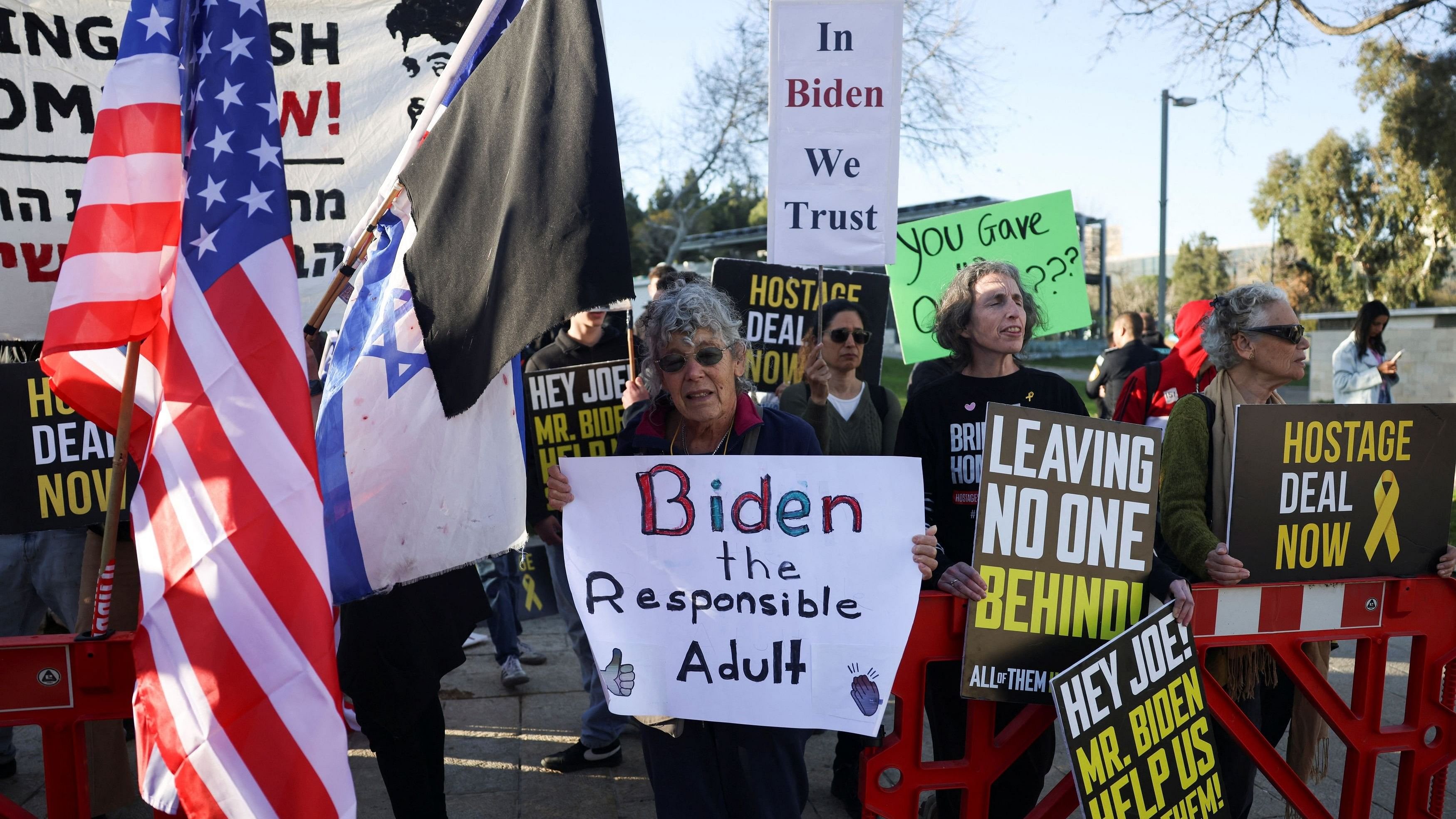 <div class="paragraphs"><p>A woman holds a sign, as protesters demonstrate outside the US Consulate, calling on U.S. President Joe Biden to broker a deal to release hostages being held by Hamas in Gaza, amid the ongoing conflict between Israel and the Palestinian Islamist group Hamas, in Jerusalem, March 5, 2024. </p></div>