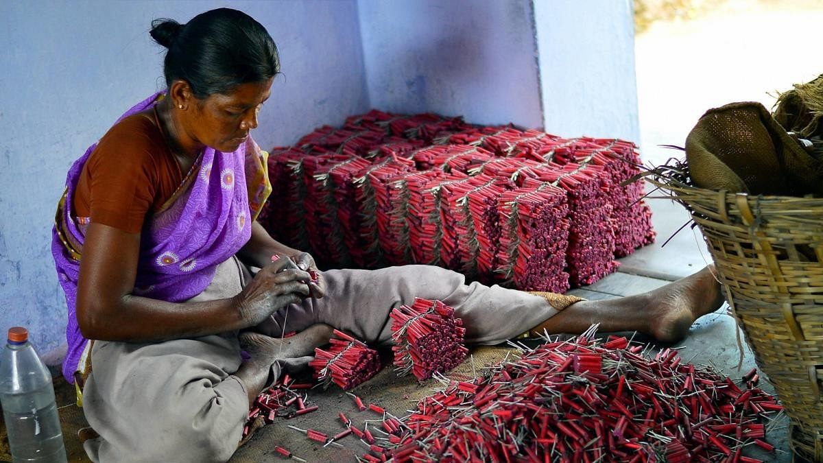 <div class="paragraphs"><p>A woman employee making crackers at a factory in Sivakasi district in Tamil Nadu.</p></div>
