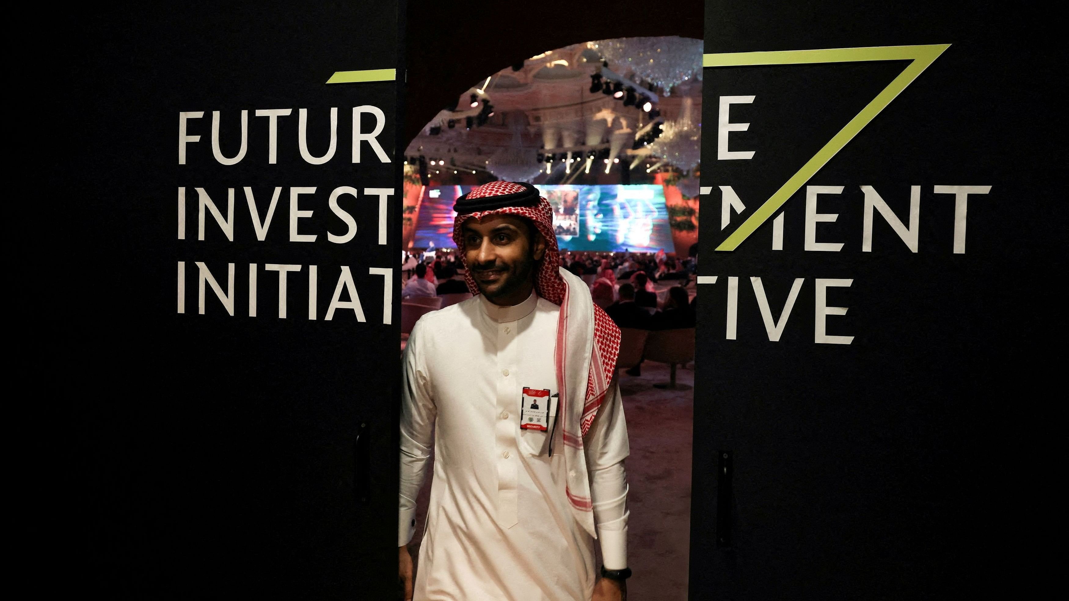 <div class="paragraphs"><p>A Saudi man's reflection is seen in mirror glass at the Future Investment Initiative conference, in Riyadh, Saudi Arabia.</p></div>
