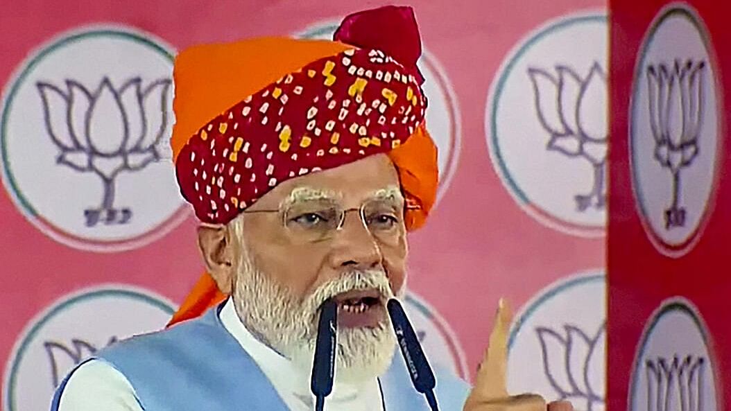 <div class="paragraphs"><p>Prime Minister Narendra Modi addresses a public rally ahead of upcoming Lok Sabha elections, in Kotputli, Rajasthan, Tuesday, April 2, 2024.</p></div>