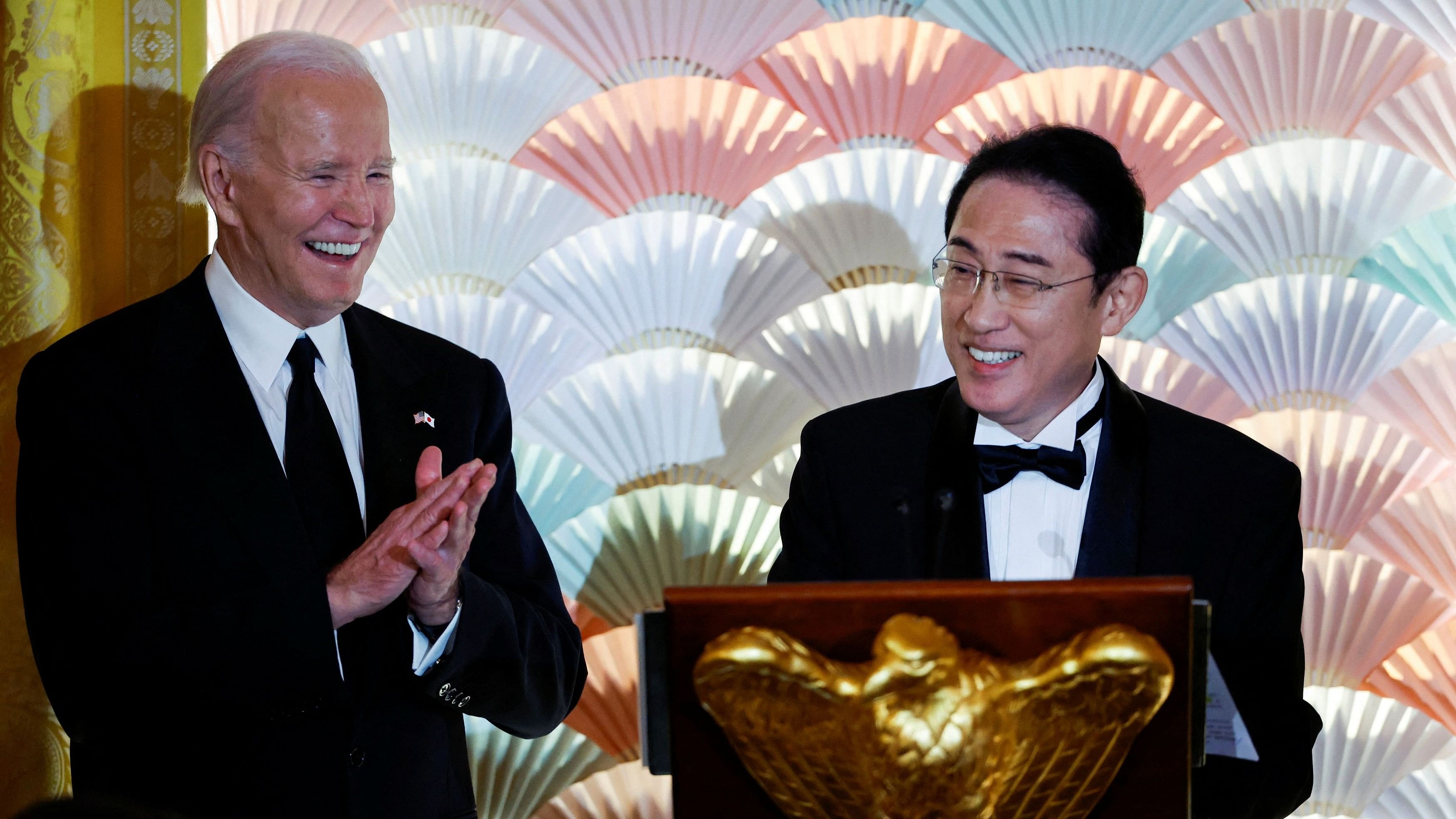 <div class="paragraphs"><p>US. President Joe Biden and Japanese Prime Minister Fumio Kishida react during an official State Dinner at the White House in Washington, US on April 10, 2024.</p></div>