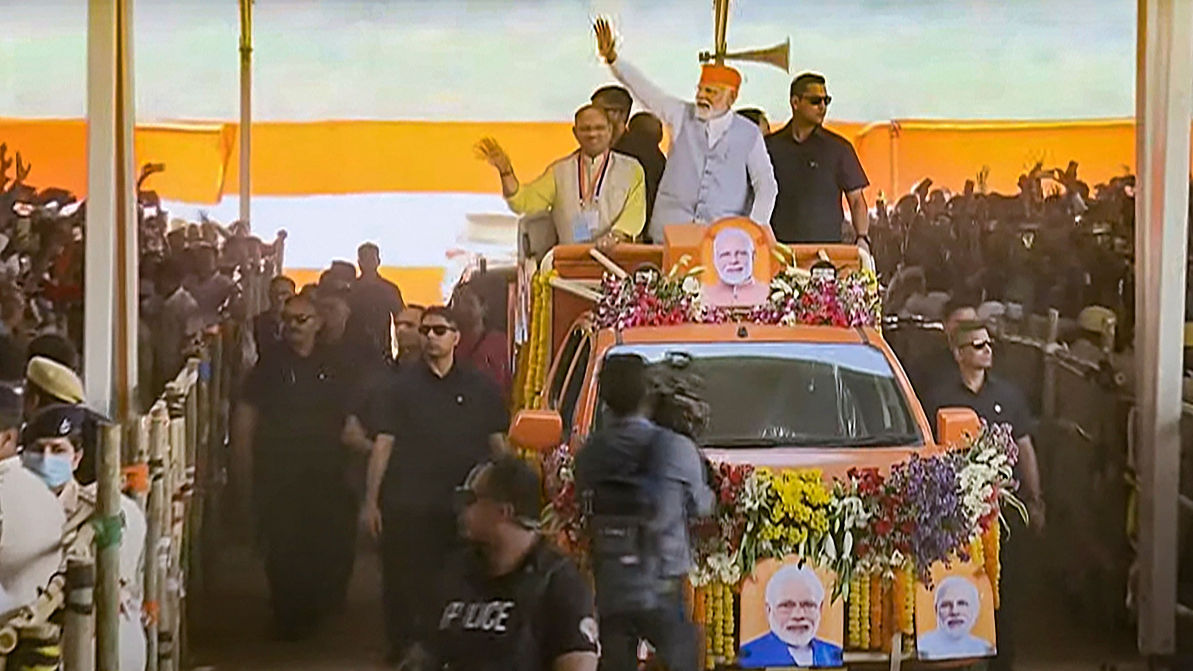 <div class="paragraphs"><p>Prime Minister Narendra Modi waves at supporters as he arrives for a public meeting, in Jajpur district, Odisha.</p></div>