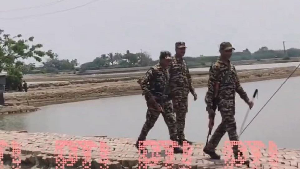 <div class="paragraphs"><p>Screengrab showing army personnel patrolling Sandeshkhali as CBI conducts searches across the area on April 26, 2024.</p></div>