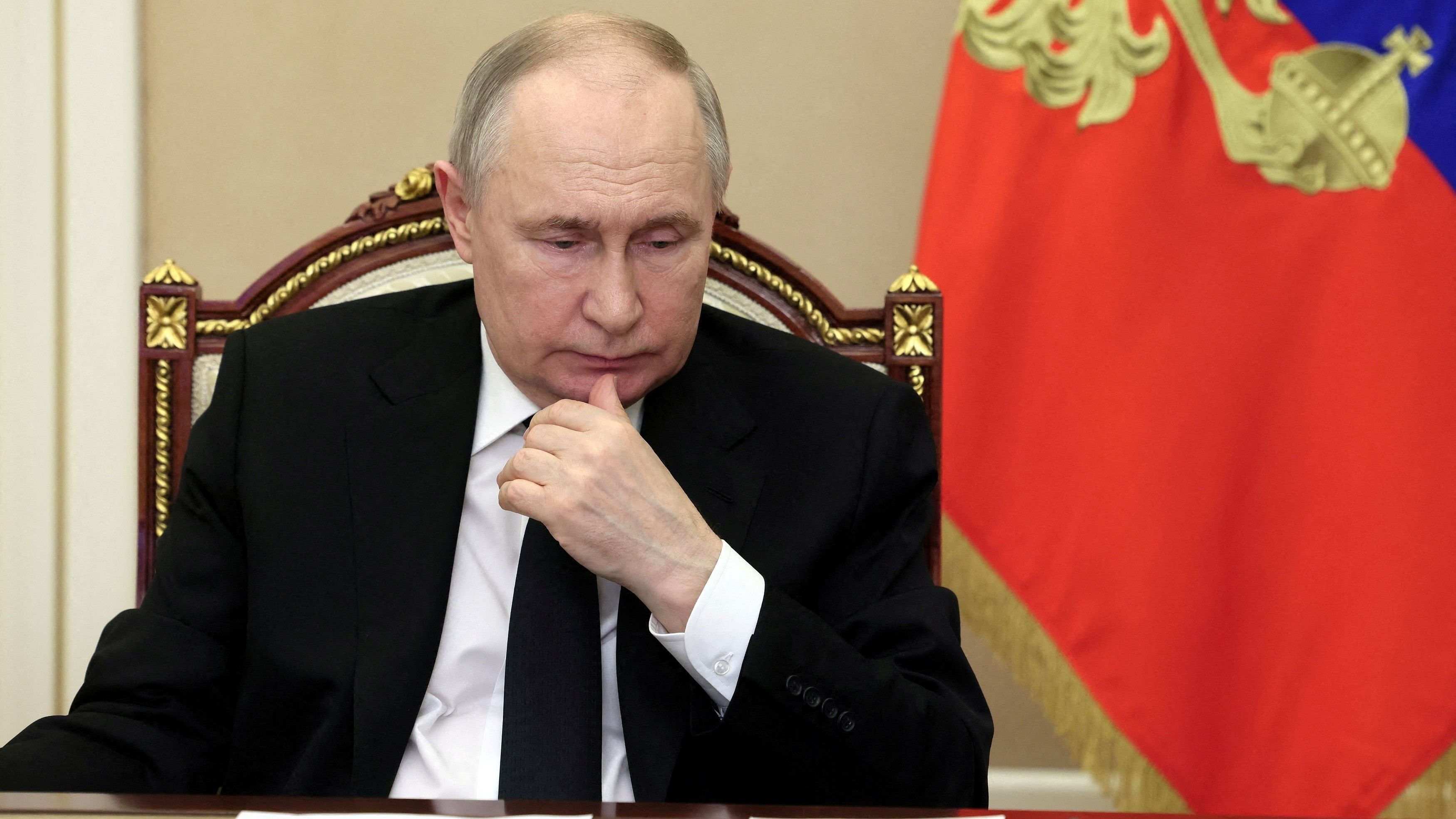 <div class="paragraphs"><p>Russian President Vladimir Putin chairs a meeting, held via video link to discuss aftermaths and measures taken after the attack on the Crocus City Hall concert venue, outside Moscow, Russia, March 25, 2024.</p></div>