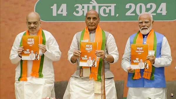 <div class="paragraphs"><p> Union Home Minister Amit Shah, Union Defence Minister Rajnath Singh and&nbsp;Prime Minister Narendra Modi release BJP’s manifesto ‘Sankalp Patra’ at the party headquarters, in New Delhi, Sunday on April 14, 2024.</p></div>