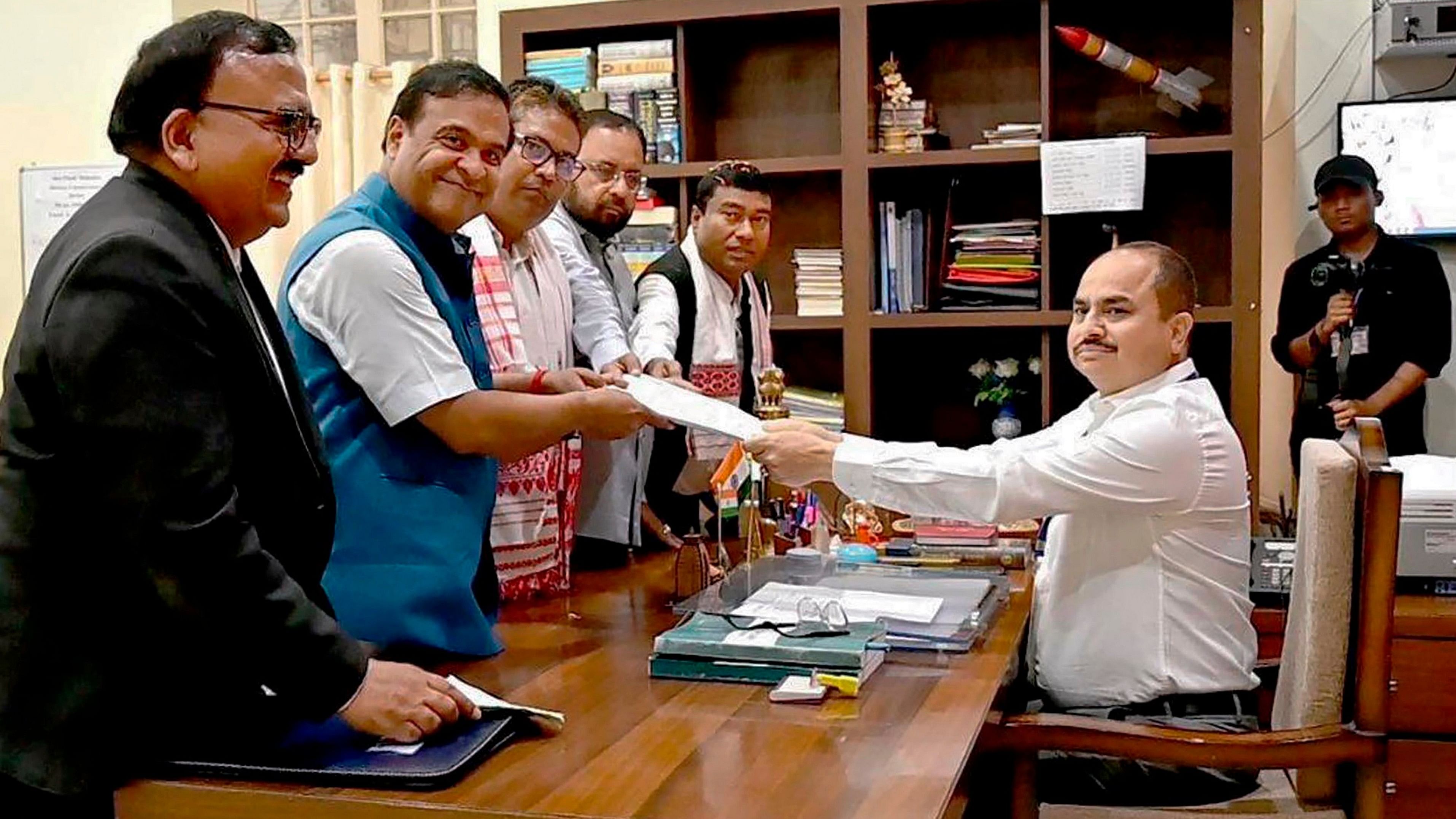 <div class="paragraphs"><p>BJP candidate for the Jorhat Lok Sabha  constituency Tapan Gogoi files his nomination papers for upcoming Lok Sabha elections in the presence of Assam Chief Minister Himanta Biswa Sarma, in Jorhat, Wednesday, March 27.</p></div>